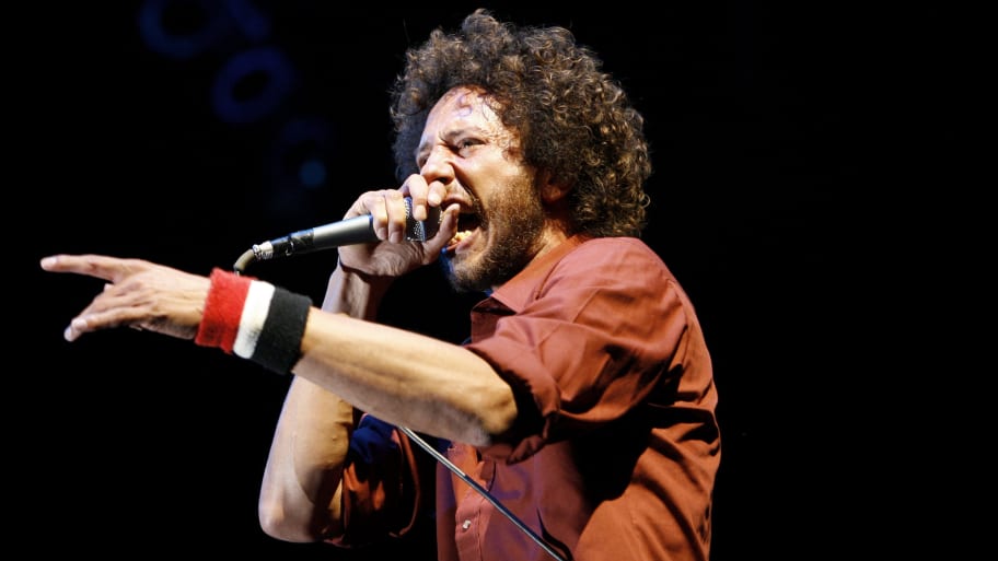 Lead singer Zack de la Rocha performs with Rage Against the Machine at their reunion concert during the Coachella Music Festival in Indio, California, April 29, 2007. The band split up in 2000. 