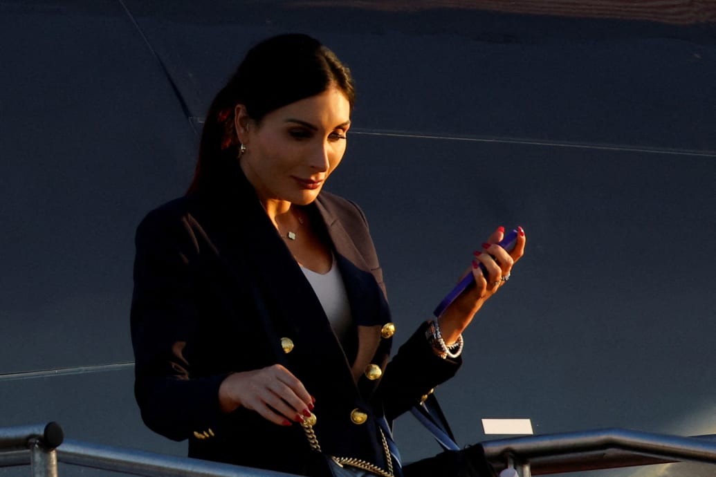 Laura Loomer walking off Trump plane