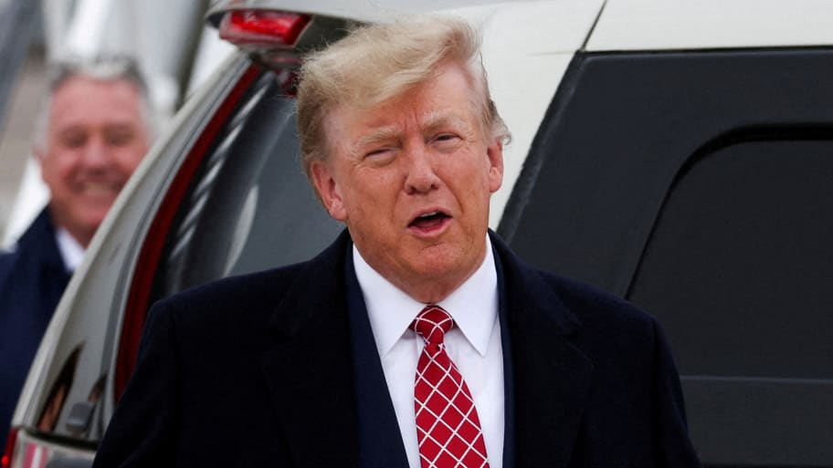 Former U.S. President and Republican presidential candidate Donald Trump reacts after arriving at Aberdeen International Airport in Aberdeen, Scotland, Britain May 1, 2023.
