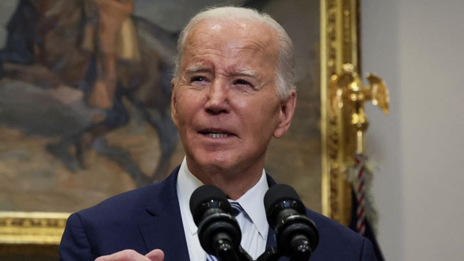 Joe Biden speaks at a podium during a press conference.