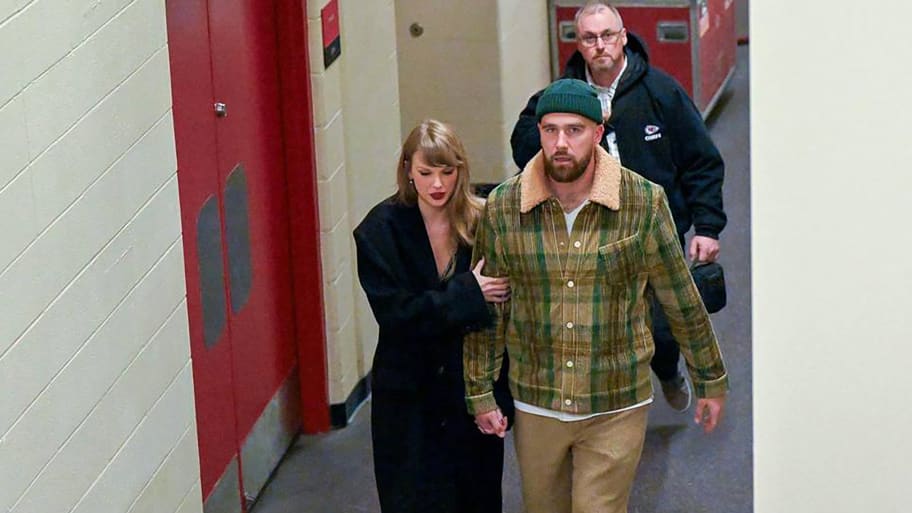 Taylor Swift, left, and Travis Kelce leave after the Buffalo Bills defeated the Kansas City Chiefs, 20-17, on Dec. 10, 2023