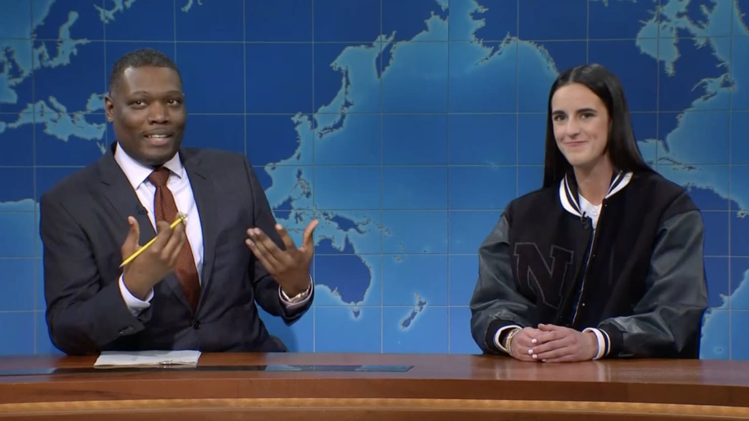 Caitlin Clark Makes Surprise Appearance on ‘SNL’ to Call Out Michael Che for Disparaging Women’s Sports