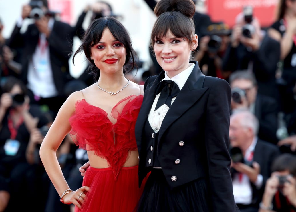 Jenna Ortega and Winona Ryder pose on the red carpet during the Venice Film Festival at  on August 28, 2024.