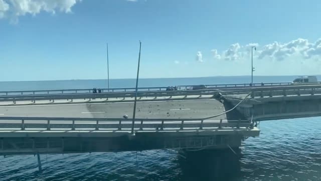 The Crimean Bridge over the Kerch Strait was damaged by what in authorities in Russia described as a fatal drone strike conducted by Ukraine.
