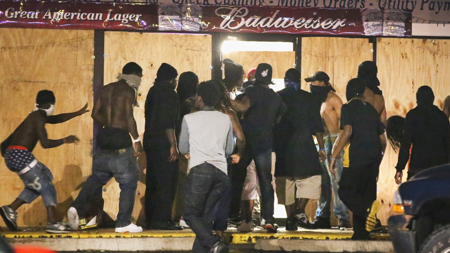Surveillance shows looting of shoe store near Ferguson night after Michael  Brown's death