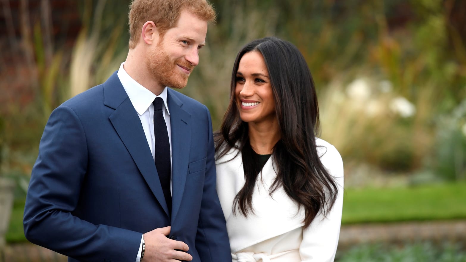 Britain's Prince Harry poses with Meghan Markle in the Sunken Garden of Kensington Palace, London, Britain, November 27, 2017.