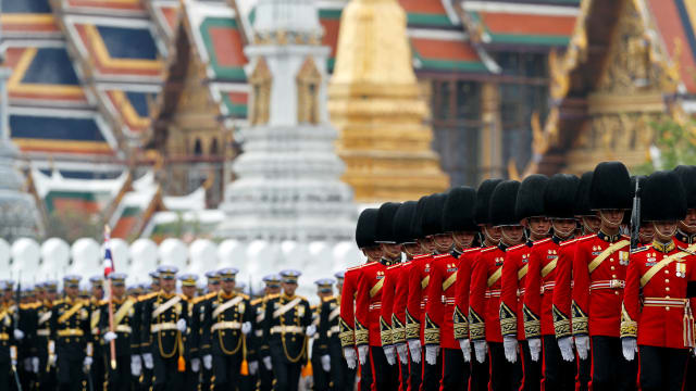 Royal Guards take part in the royal cremation procession of late King Bhumibol Adulyadej in front of the the Grand Palace in Bangkok, Thailand, October 26, 2017.