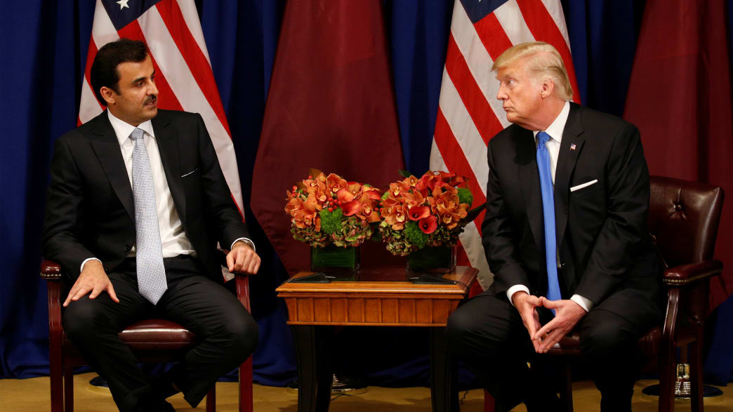 U.S. President Donald Trump meets with Qatar's Emir Sheikh Tamim bin Hamad al-Thani