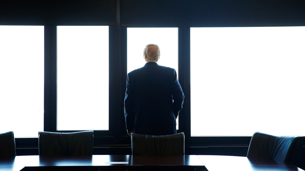 Republican U.S. presidential nominee Donald Trump looks out at Lake Michigan during a visit to the Milwaukee County War Memorial Center in Milwaukee, Wisconsin August 16, 2016.