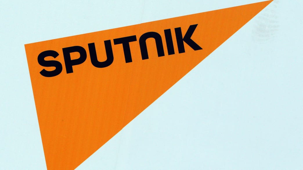 The logo of Russian state news agency Sputnik is seen on a board at the St. Petersburg International Economic Forum 2017 (SPIEF 2017) in St. Petersburg, Russia, June 1, 2017. Picture taken June 1, 2017. REUTERS/Sergei Karpukhin - RC17834DEB30