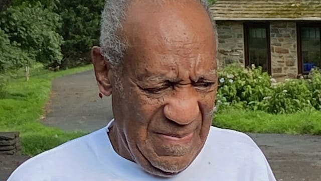 Bill Cosby speaks to reporters outside of his home