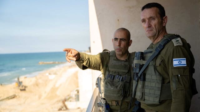 Israeli army Chief of Staff, Herzi Halevi listens to an officer as he visited soldiers during the ongoing ground operation of the Israeli army against Palestinian Islamist group Hamas