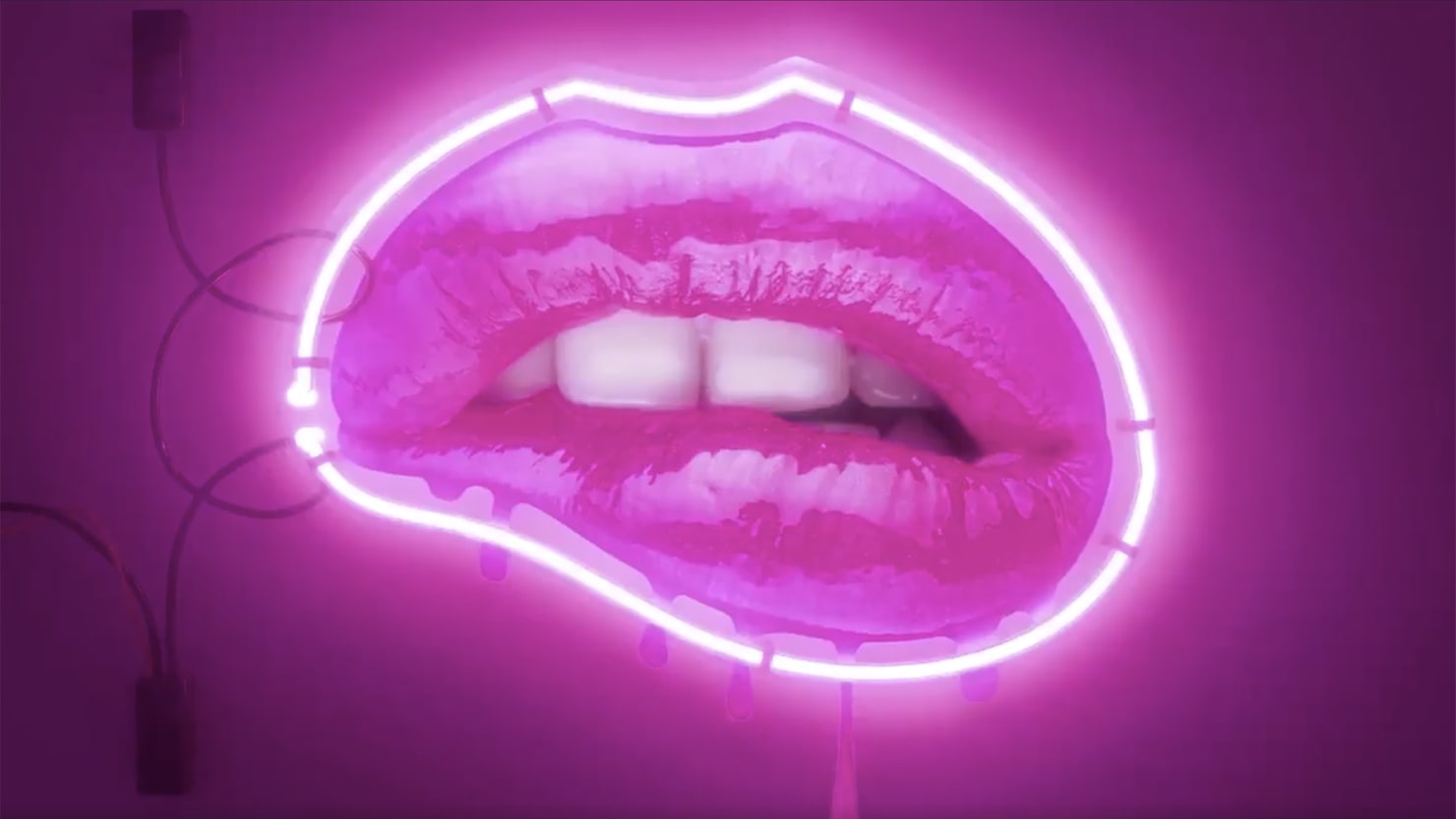 Neon’ work—an image of strawberry-lacquered, neon-lined lips—in promotional...