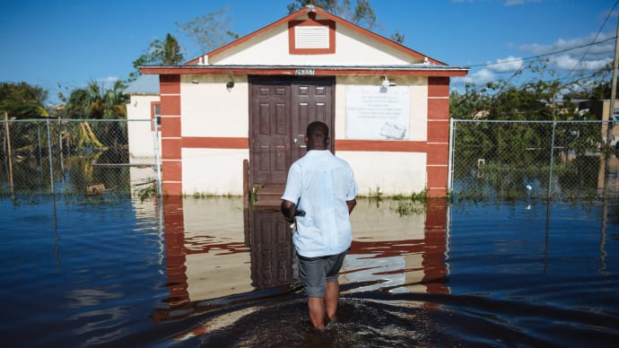 Immokalee, United States: Hurricane Irma. Louicesse Dormaint, Pastor of Haitian United Evangelical Mission in Immokalee outside his church.