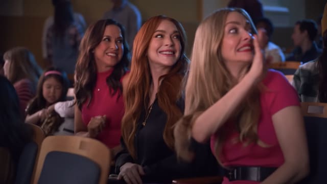 Still of Lacey Chabert, Lindsay Lohan, and Amanda Seyfried in Walmart 'Mean Girls' commercial.