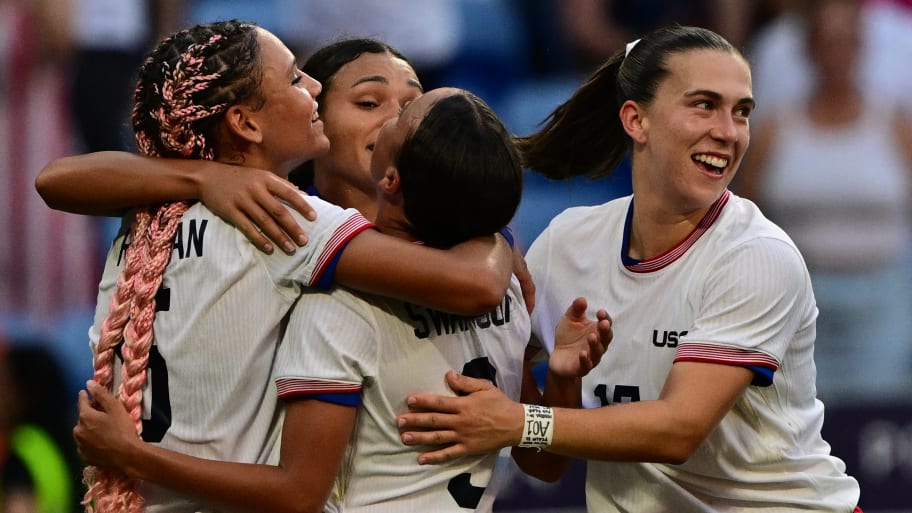 US' forward #11 Sophia Smith celebrates scoring in the 95th minute during the women's semi-final football match between USA and Germany during the Paris 2024 Olympic Games at the Lyon Stadium in Lyon on August 6, 2024. 