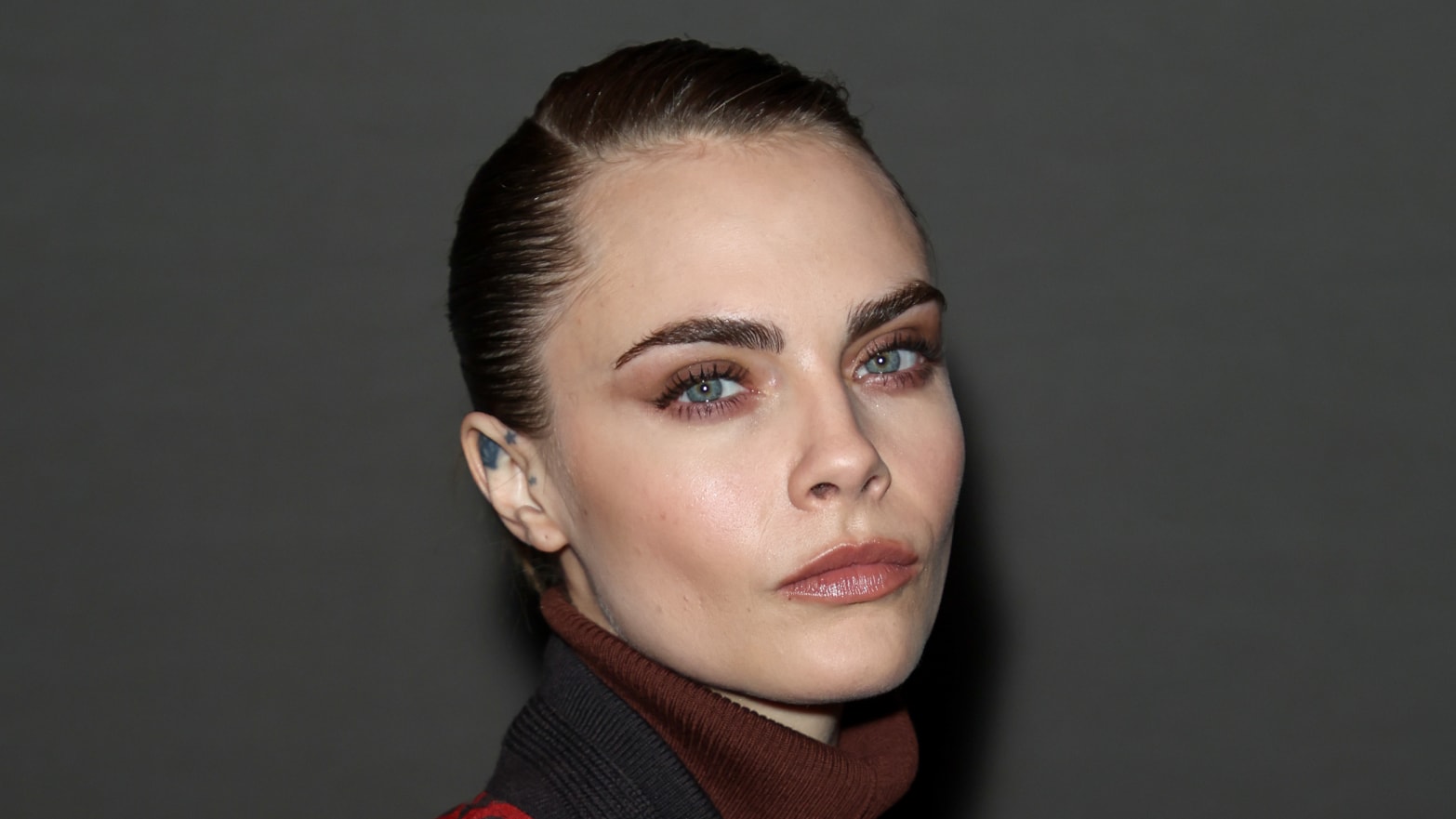 Cara Delevingne attends the Burberry Winter 2024 show during London Fashion Week on Feb. 19, 2024, in London, England.