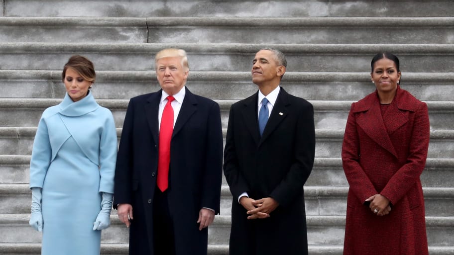 Melania Trump, Donald Trump, Barack Obama and Michelle Obama standing on the U.S. Capitol steps.
