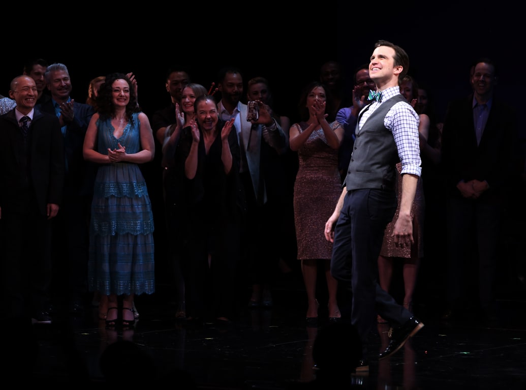 Gavin Creel with cast during the curtain call bows for the Actors Fund's 15th Anniversary Reunion Concert of 'Thoroughly Modern Millie' on February 18, 2018 at the Minskoff Theatre in New York City.
