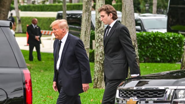 Former U.S. President Donald Trump and his son Barron Trump attend the funeral of former first lady Melania Trump’s mother Amalija Knavs in January 2024.