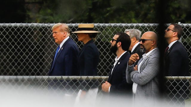 Donald and Melania Trump enter son Barron’s graduation ceremony in West Palm Beach, Florida.