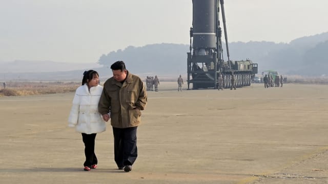 North Korean leader Kim Jong Un walks away from an intercontinental ballistic missile (ICBM) in this undated photo released on November 19, 2022 by North Korea's Korean Central News Agency (KCNA). REUTERS IS UNABLE TO INDEPENDENTLY VERIFY THIS IMAGE.