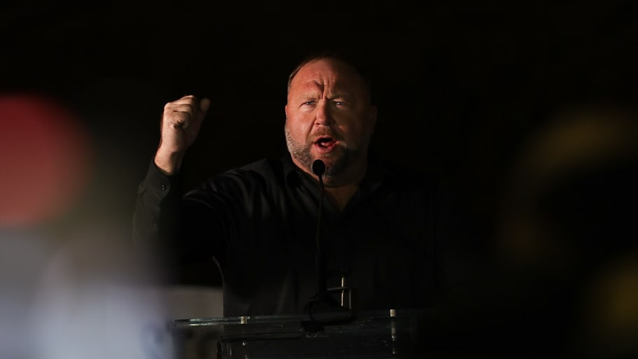 InfoWars website coordinator Alex Jones gives a speech to Trump supporters before the Congress count the Electoral College votes in Washington D.C.