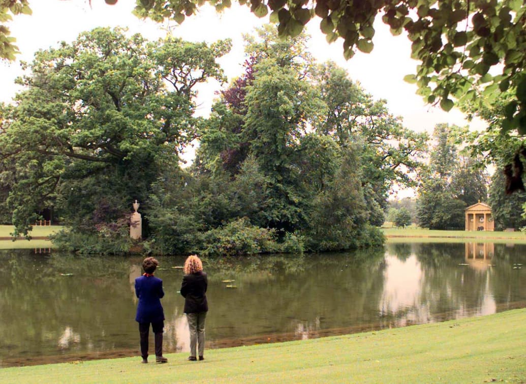 Members of the public view the lake at Althorp with the Diana Urn on the Island and the Diana Doric Temple to the right, July 1, 1998. The Estate opened its gates for the first time that day, on what would have been Princess Diana's 37th birthday.