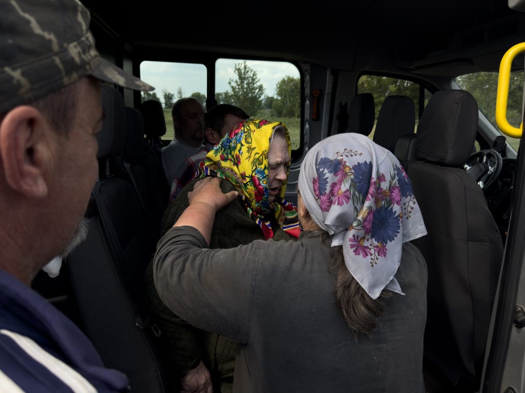 Elderly women evacuating in Ukraine.