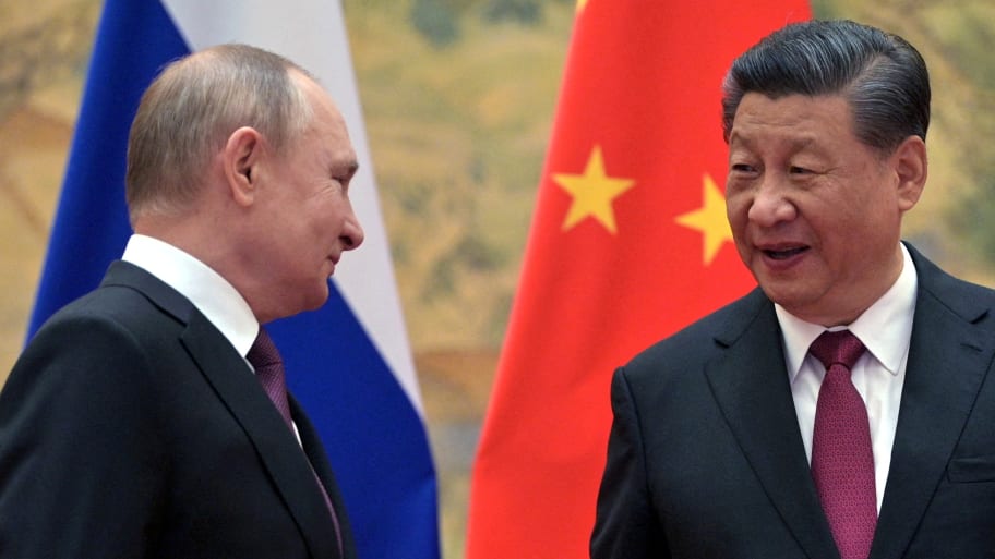 Russian President Vladimir Putin attends a meeting with Chinese President Xi Jinping in Beijing, China, Feb. 4, 2022.