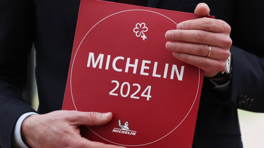 International Director of the Michelin Guides Gwendal Poullennec displays One MICHELIN Key panel during the press conference in Paris, France, April 8, 2024.