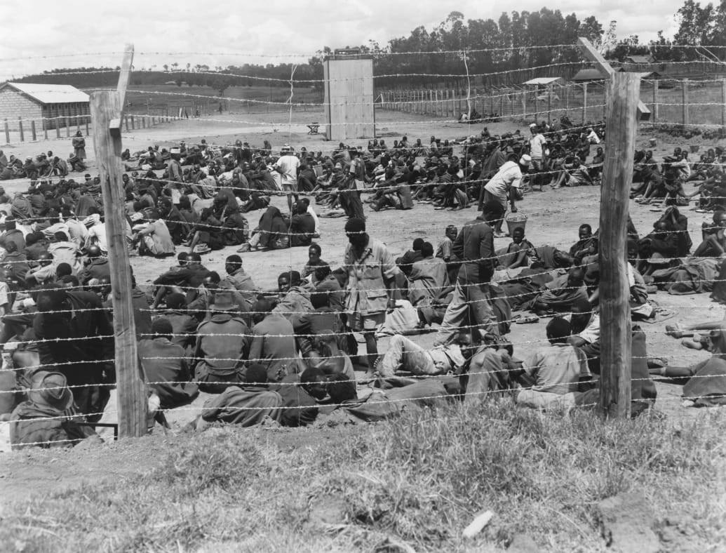 Kikuyu tribe members held in an internment camp by the British government, during the Mau Mau Rebellion.