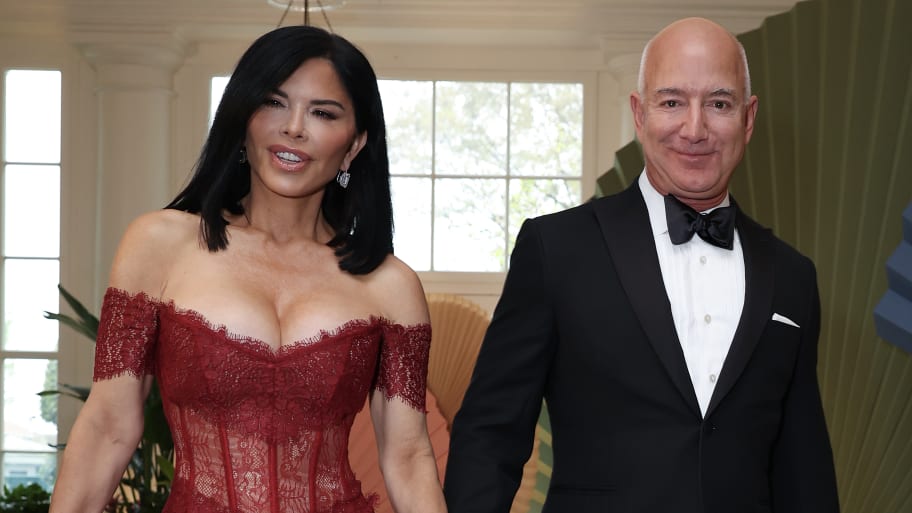 Amazon founder Jeff Bezos (R) and his fiancee Lauren Sanchez arrive at the White House for a state dinner on April 10, 2024 in Washington, DC. 