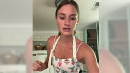 Lilly Gaddis speaks while cooking for a TikTok video.