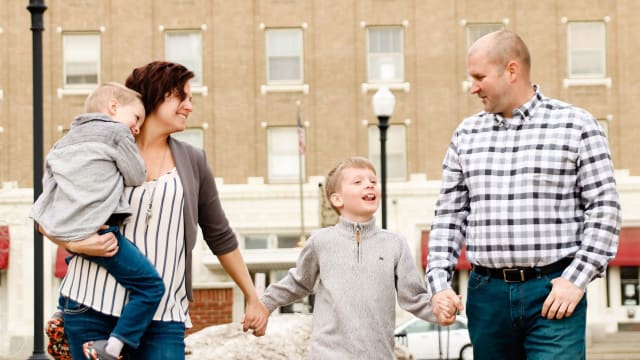 North Dakota State Senator Doug Larsen, his wife, Amy, and their two children. 