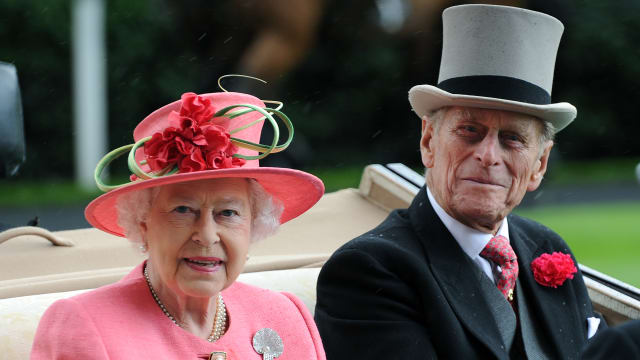 Queen Elizabeth ll and Prince Philip, Duke of Edinburgh arrive in an open carriage on Ladies Day at Royal Ascot on June 16, 2011 in Ascot, United Kingdom.