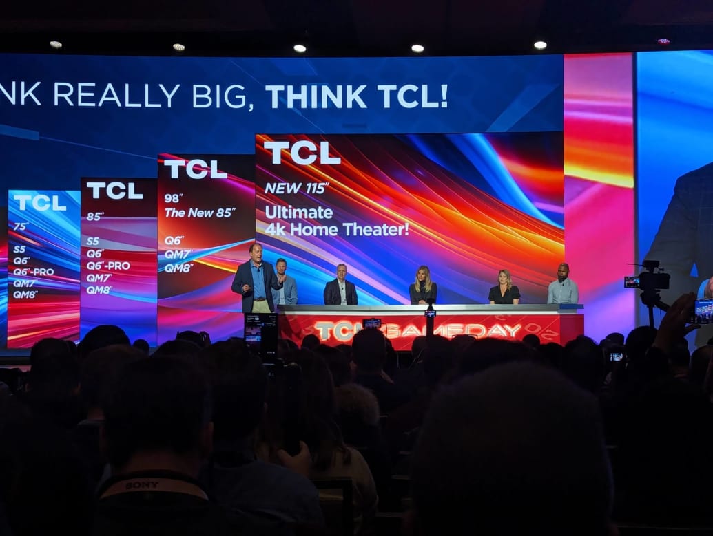 Scott Ramirez, TCL's VP of product marketing and development, unveils the 115-inch television at CES. 