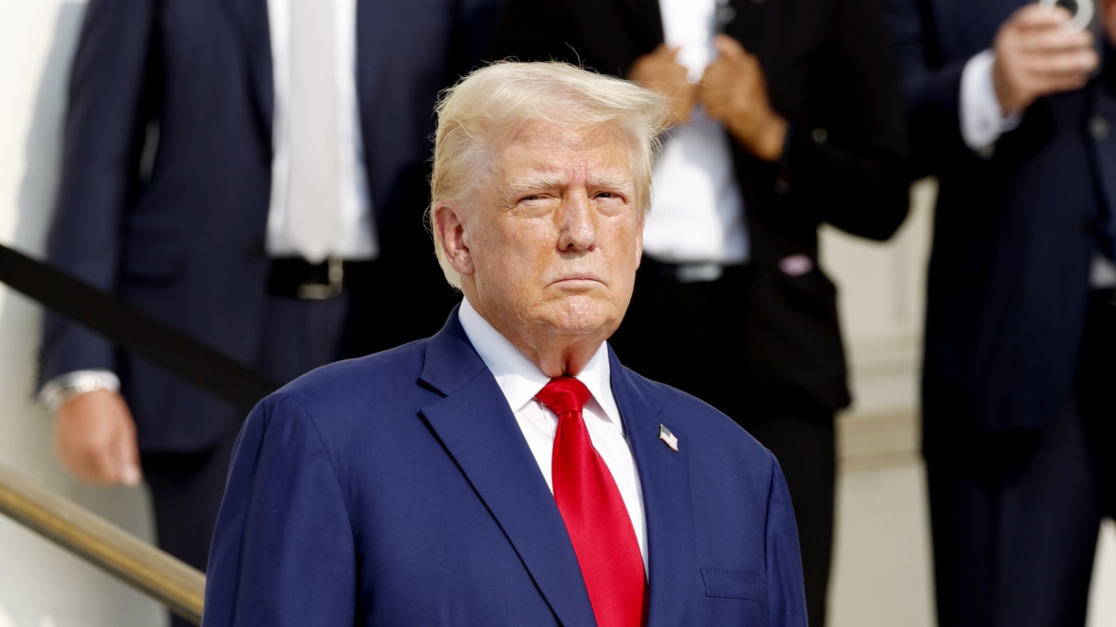 Republican presidential nominee, former U.S. President Donald Trump looks on during a wreath laying ceremony at the Tomb of the Unknown Soldier at Arlington National Cemetery on August 26, 2024