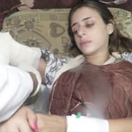 Mia Schem has her arm bandaged in a clip shared by Hamas while she was being held hostage in Gaza.
