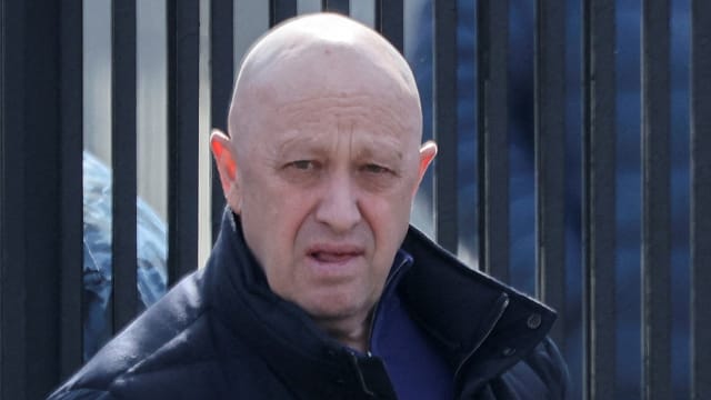 Founder of Wagner private mercenary group Yevgeny Prigozhin leaves a cemetery before the funeral of a Russian military blogger who was killed in a bomb attack in a St Petersburg cafe, in Moscow, Russia, April 8, 2023