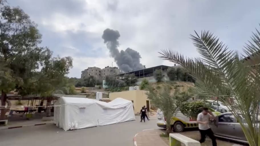 A screen grab captured from a video shows that smoke rises after Israeli airstrikes on Indonesian Hospital in Gaza City