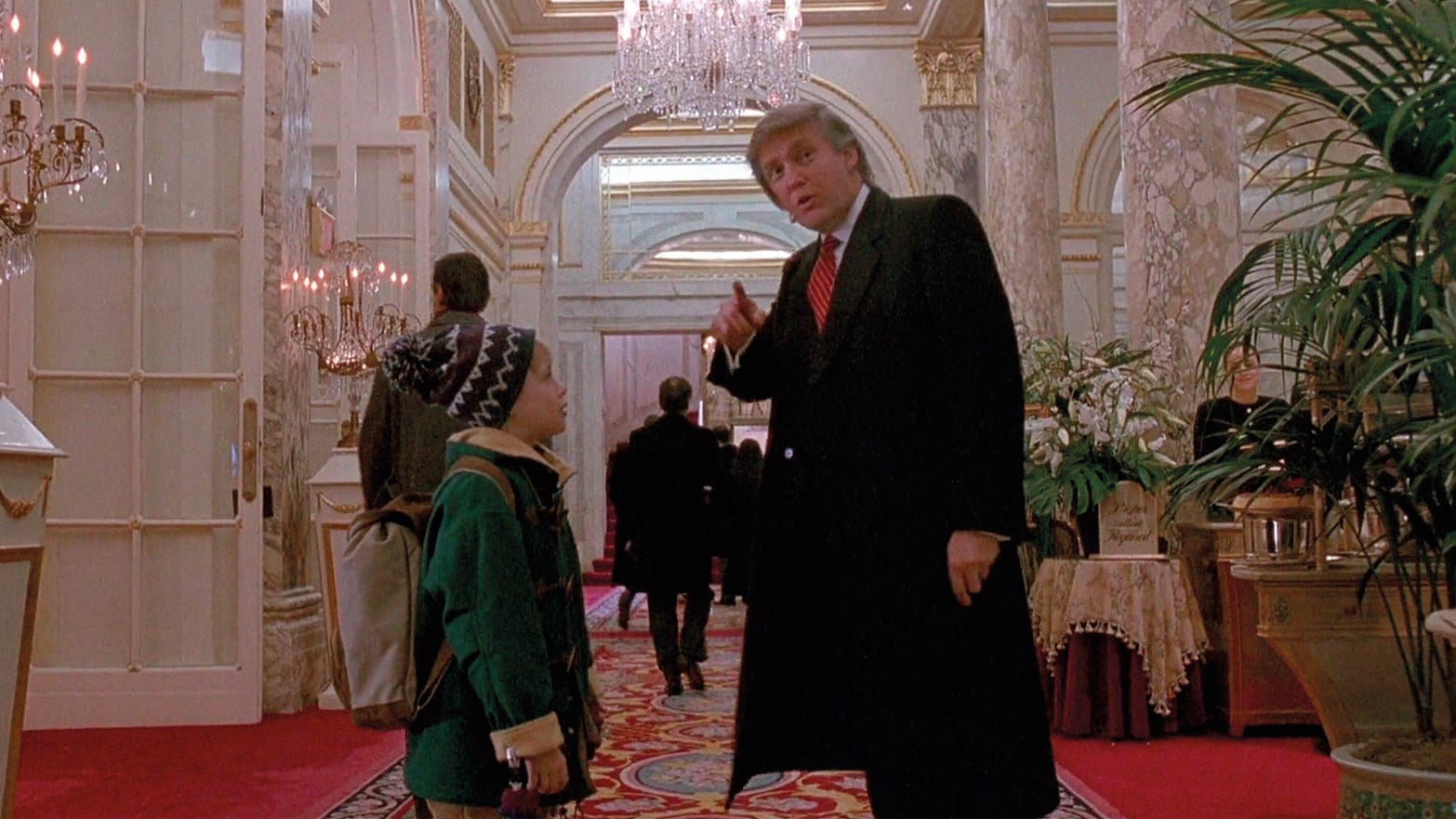 Donald Trump points with Macaulay Culkin in a still from Home Alone 2