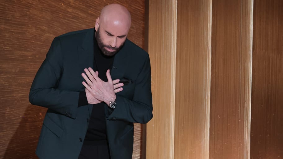 Actor John Travolta speaks at the start of the In Memoriam segment of the Oscars show at the 95th Academy Awards in Hollywood.