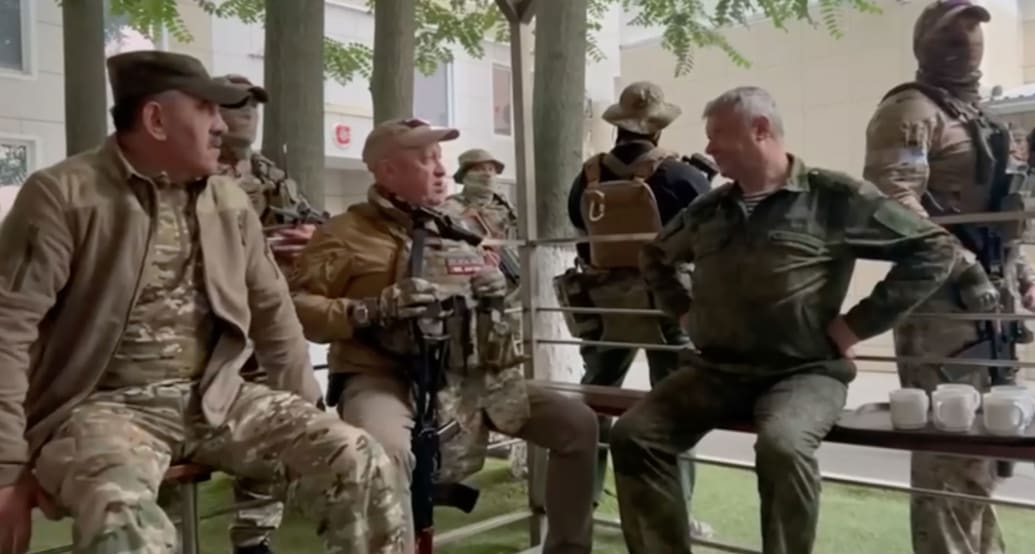 A screen grab captured from a video shows Wagner chief Yevgeny Prigozhin surrounded by fighters of the paramilitary Wagner group.