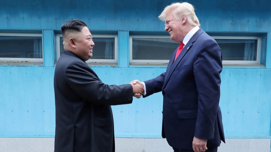 U.S. President Donald Trump shakes hands with North Korean leader Kim Jong Un as they meet at the demilitarized zone separating the two Koreas, in Panmunjom, South Korea, June 30, 2019. 