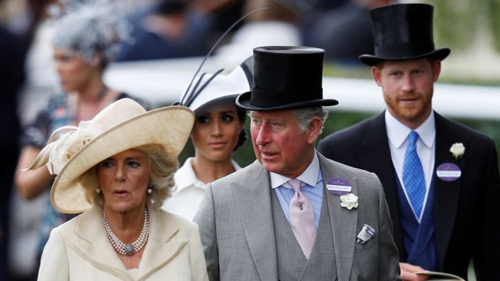 Charles, then-Prince of Wales, Camilla, Duchess of Cornwall, Britain's Prince Harry and Meghan, the Duchess of Sussex arrive at Ascot racecourse, June 19, 2018.