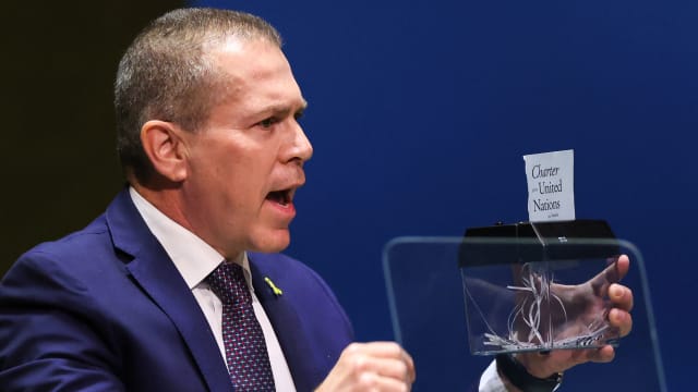 Israeli Ambassador to the United Nations Gilad Erdan shredded a copy of the Charter of the UN as he speaks during a special session of the UN General Assembly in New York City on May 10, 2024. 