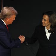 Donald Trump and Kamala Harris shake hands before Tuesday’s debate.