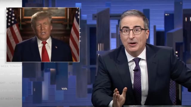 John Oliver hosting his show with an image of President Donald Trump in the corner.