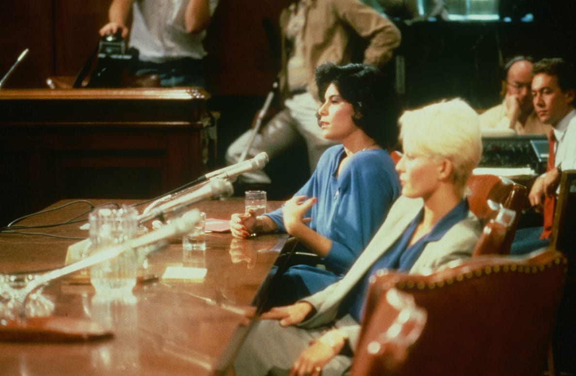 Veronica Vera, black hair, and Seka, another porn star, testify before the Senate Judiciary Subcommittee on Juvenile Justice in October 1984. 